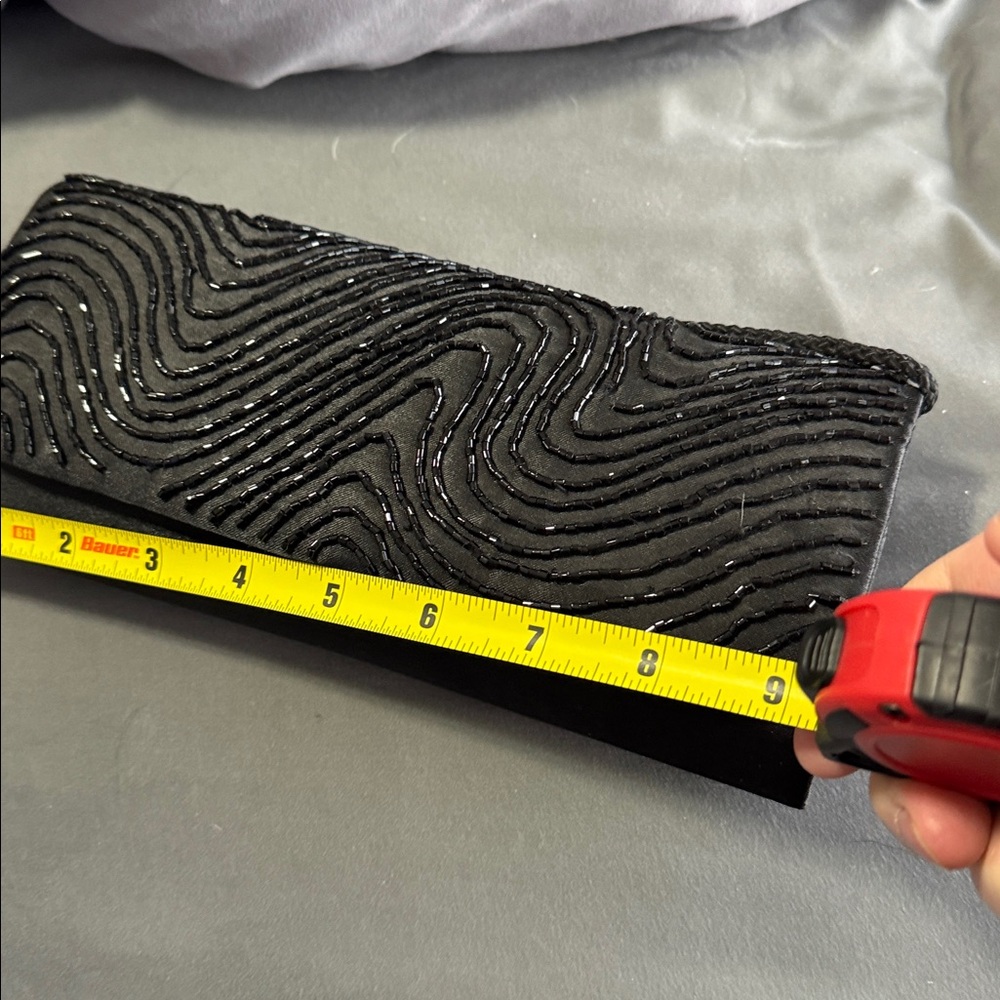Elegant Black Beaded Evening Clutch
Plus free sheer shoulder wrap. - Picture 8 of 10